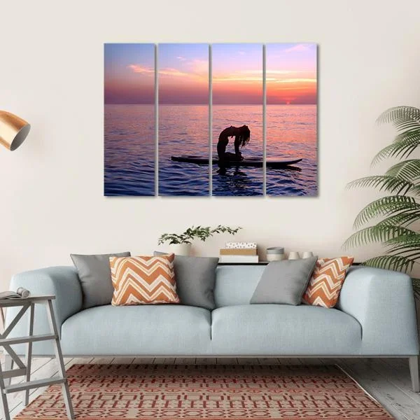 Yoga Trainer On The Paddle Board Canvas Wall Art